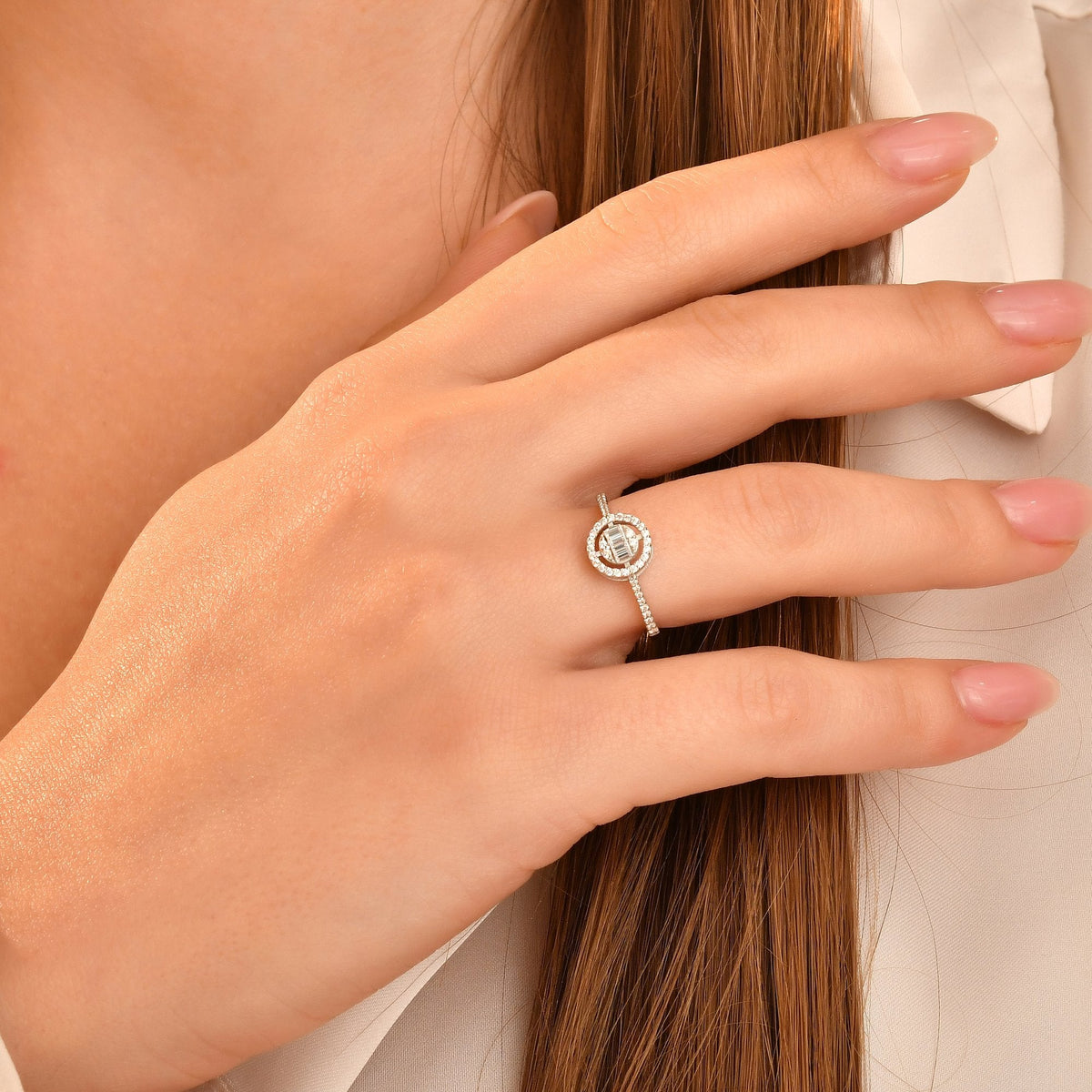 0.25 Carat Round and Baguette Diamond Ring
