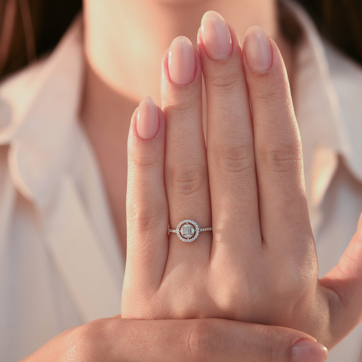 0.25 Carat Round and Baguette Diamond Ring