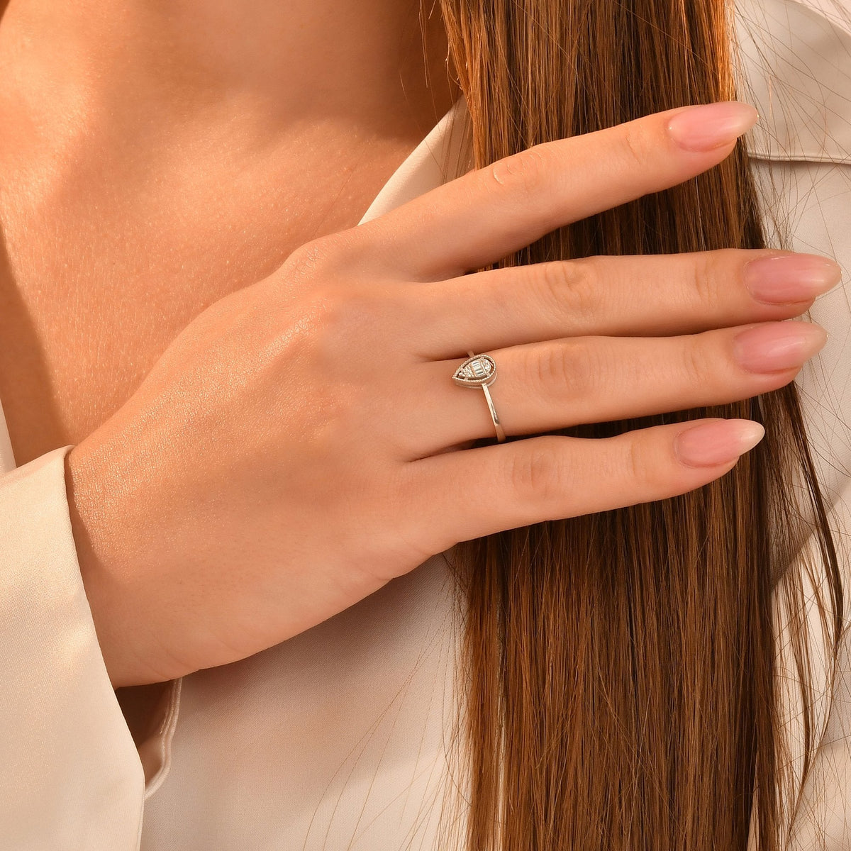 0.06 Carat Baguette Diamond Ring