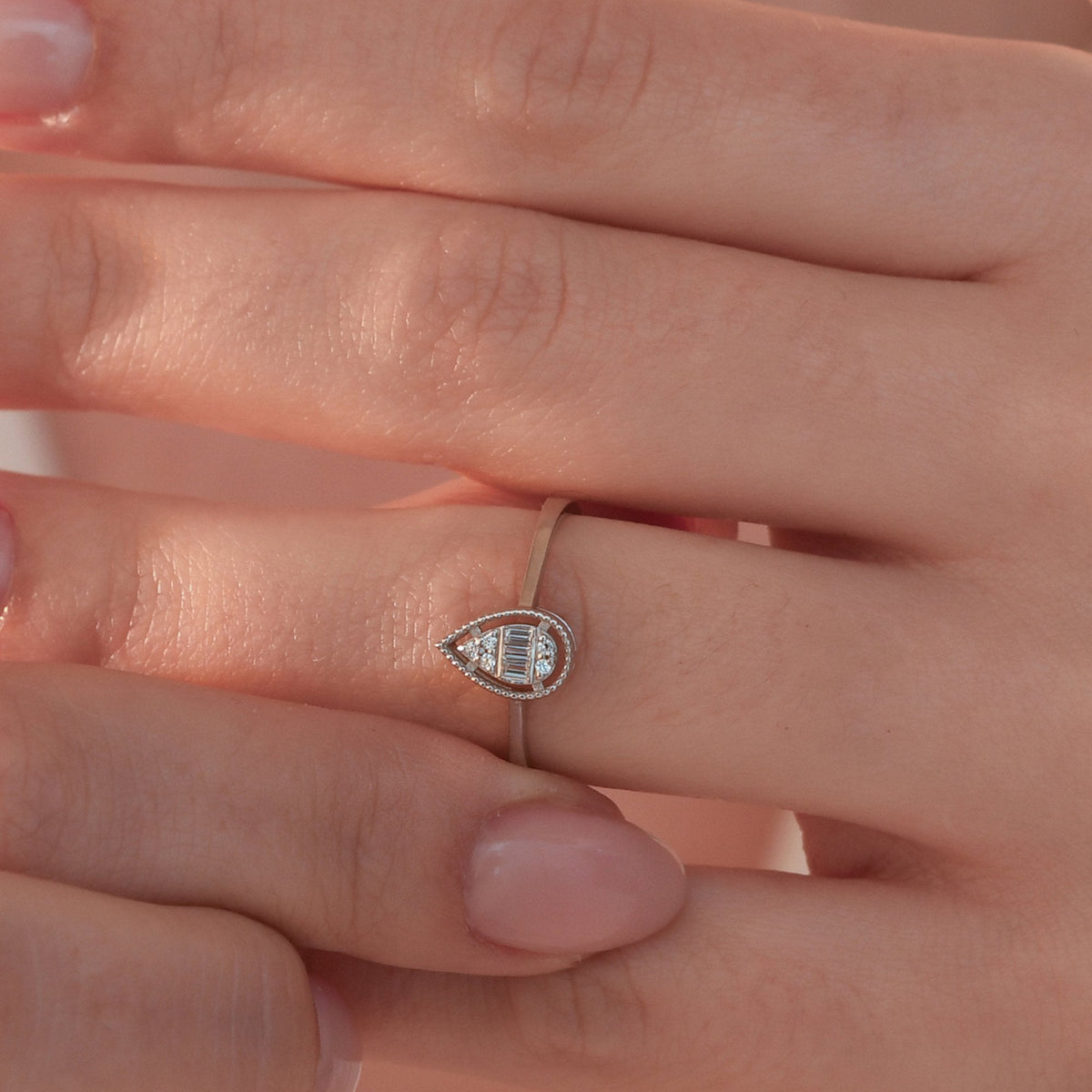 0.06 Carat Baguette Diamond Ring