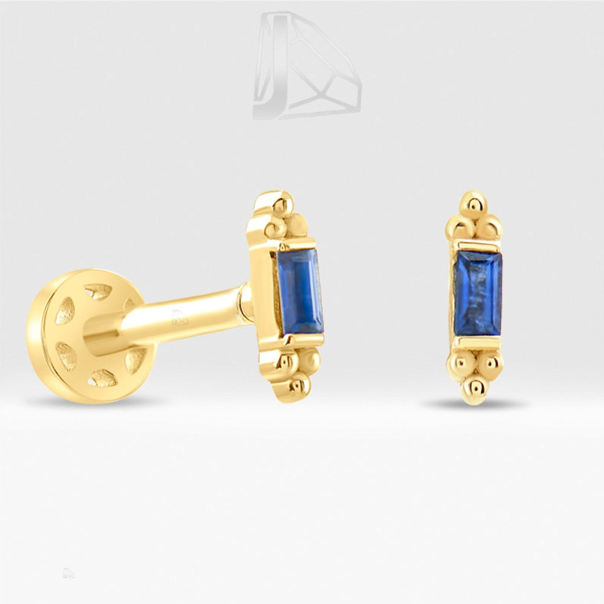 0.06 Carat Baguette Sapphire Piercing · Yellow Gold