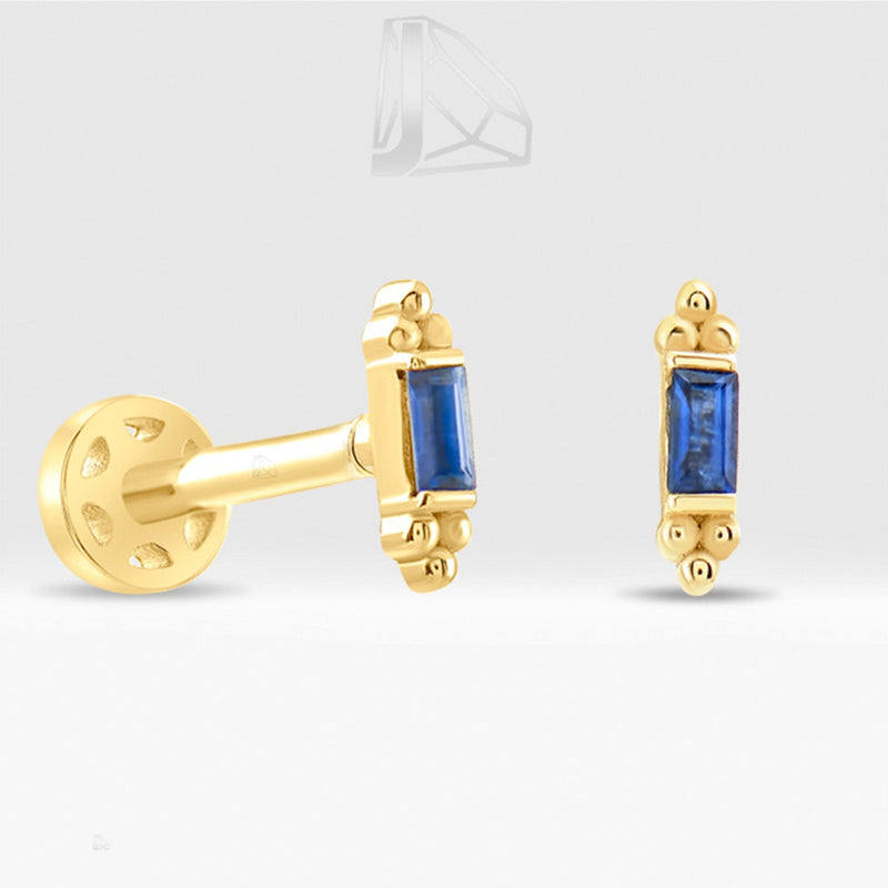 0.06 Carat Baguette Sapphire Piercing · Yellow Gold