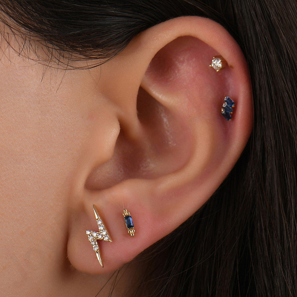 0.06 Carat Baguette Sapphire Piercing