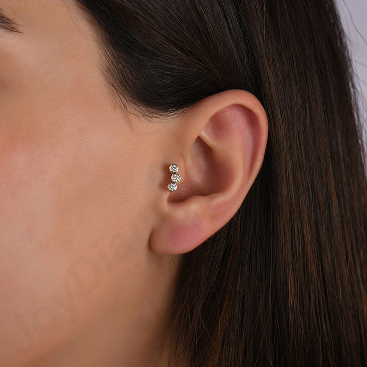 0.15 Carat Three-Stone Diamond Piercing