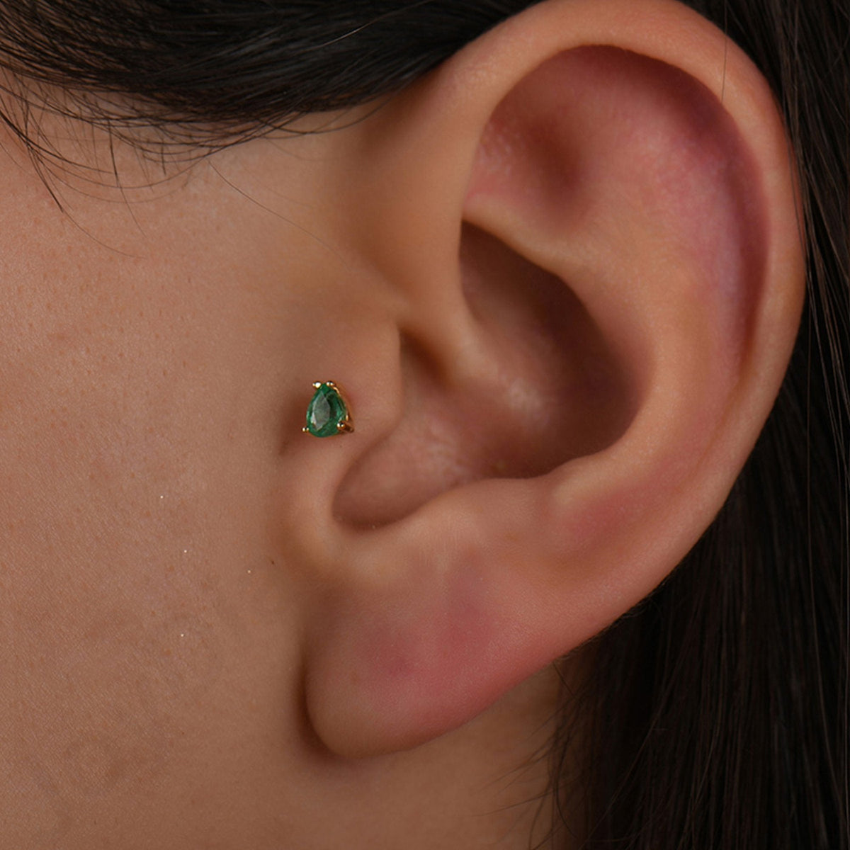 0.15 Carat Pear Emerald Piercing
