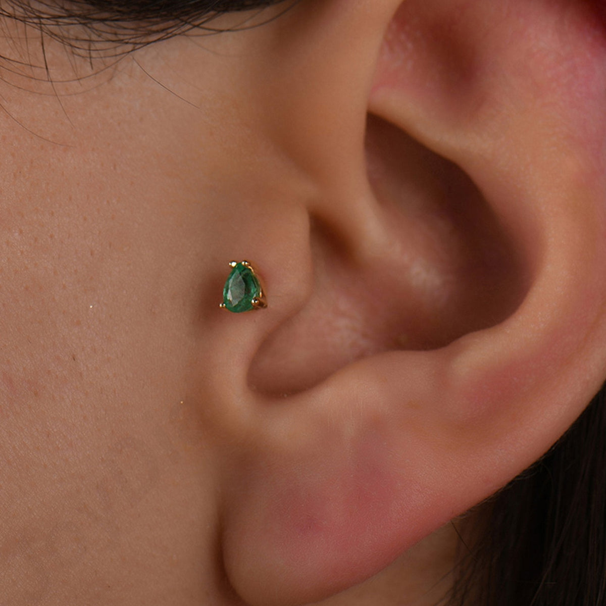 0.15 Carat Pear Emerald Piercing
