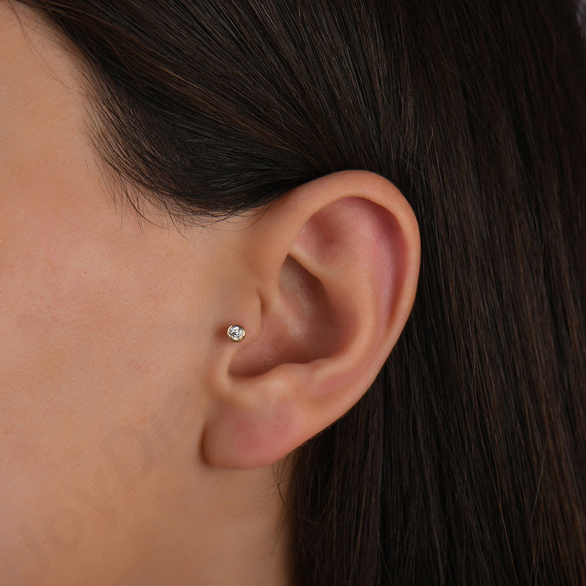 0.06 Carat Solitaire Diamond Piercing