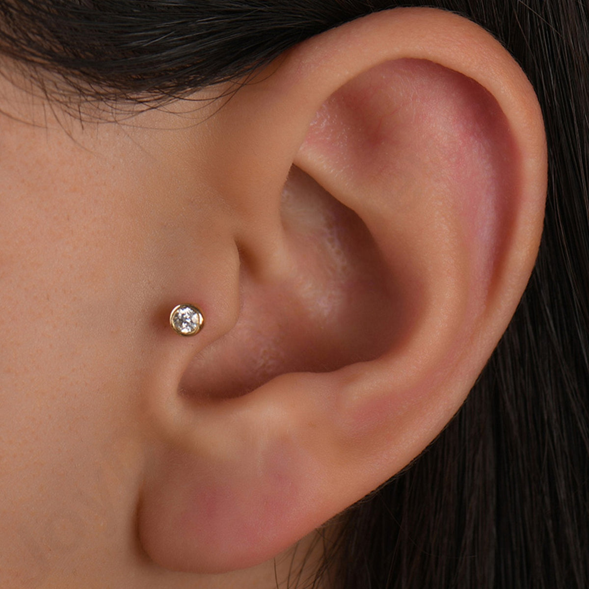 0.06 Carat Solitaire Diamond Piercing