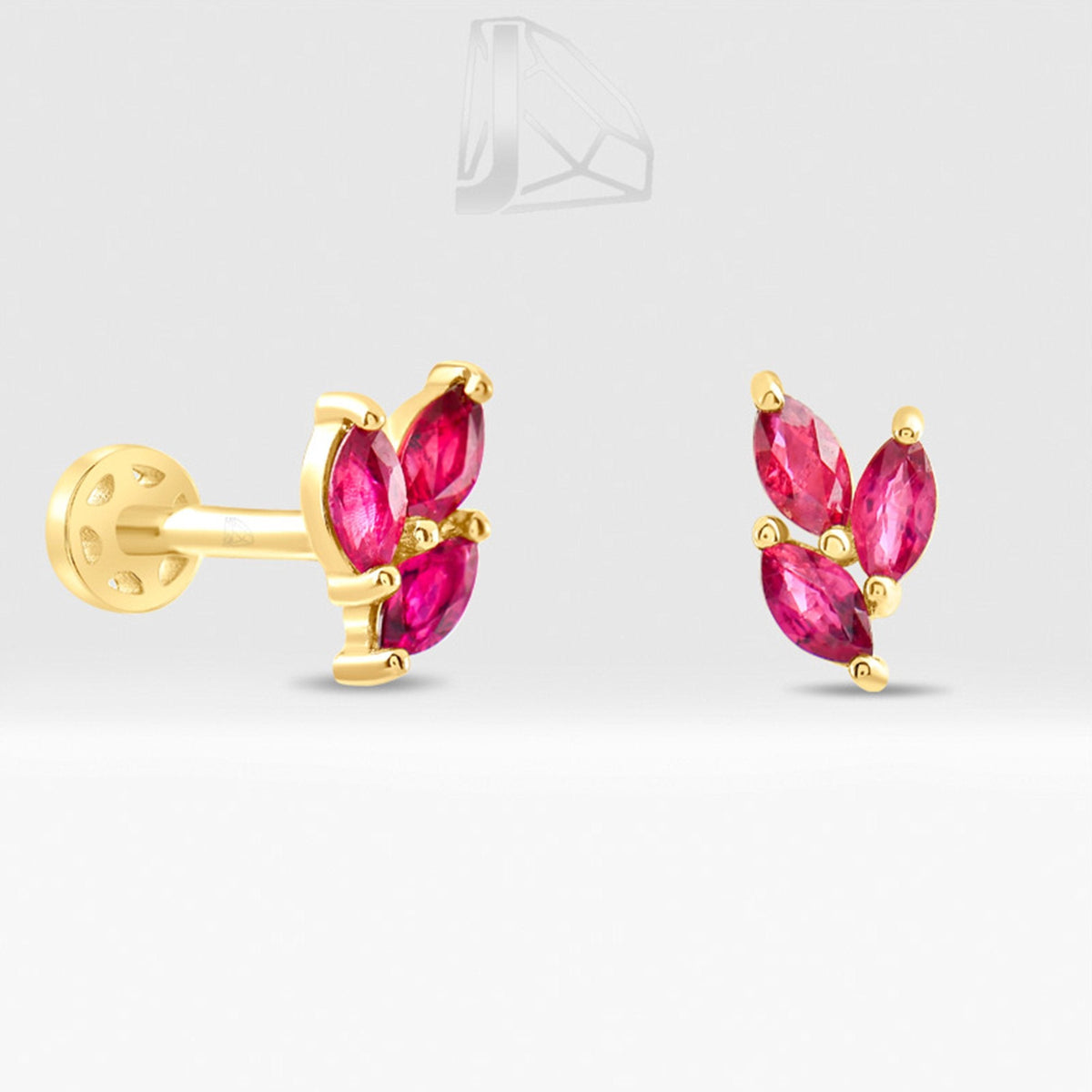 0.20 Carat Marquise Ruby Piercing · Yellow Gold