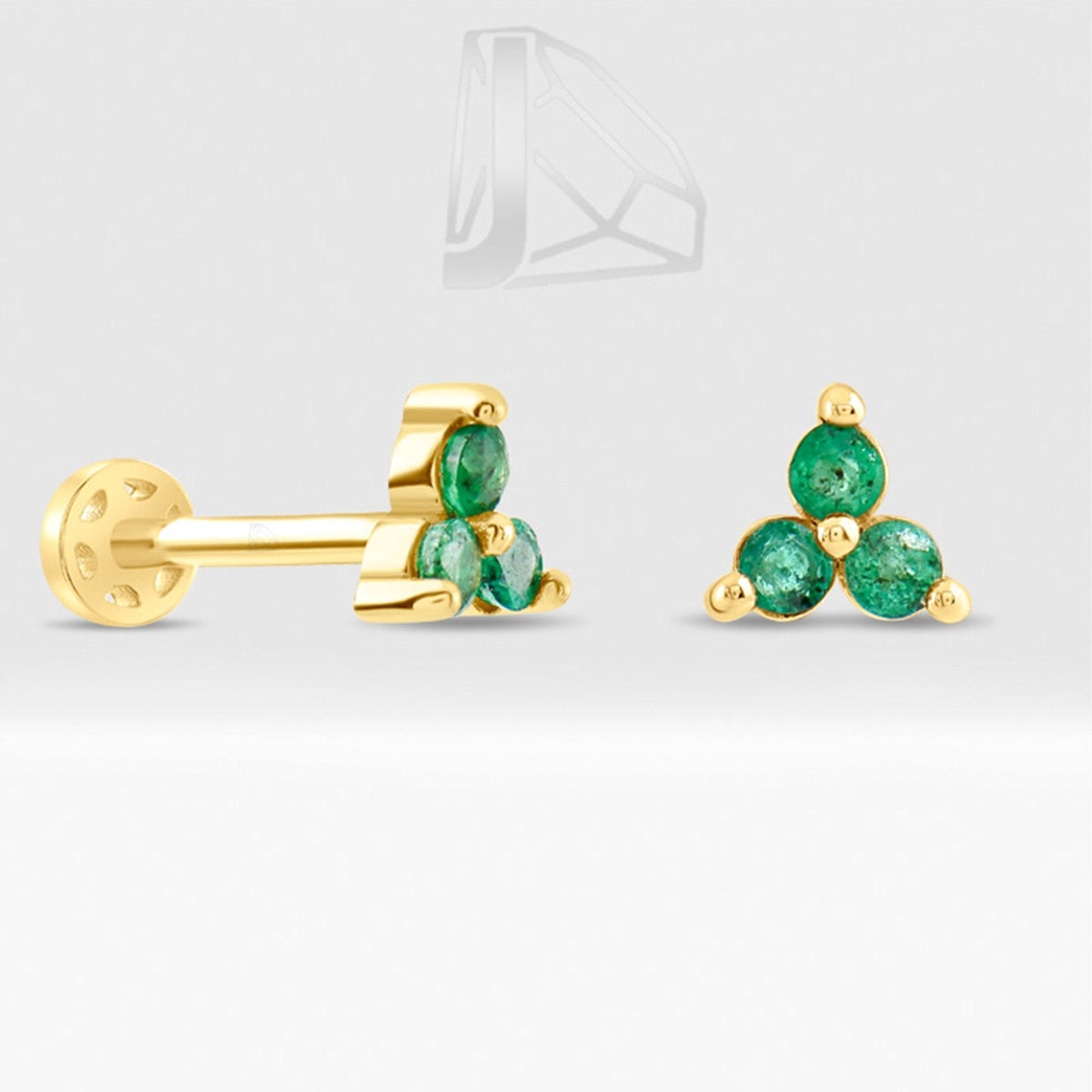0.15 Carat Three-Stone Emerald Piercing · Yellow Gold