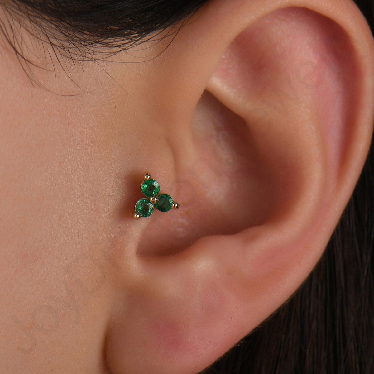 0.15 Carat Three-Stone Emerald Piercing