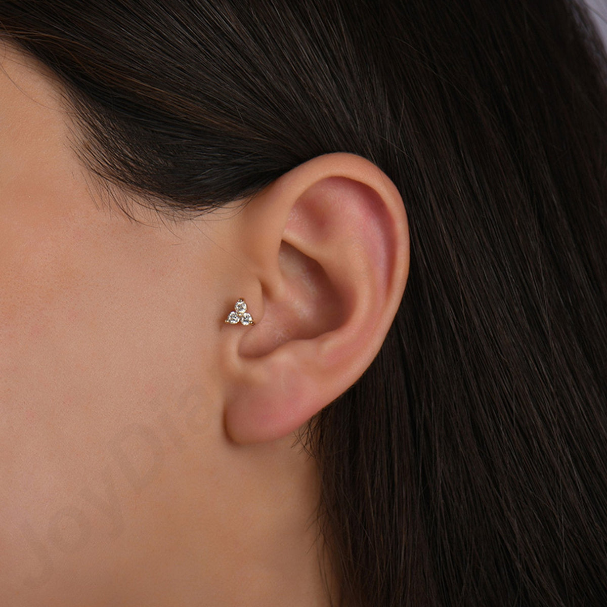 0.15 Carat Triangle Diamond Piercing