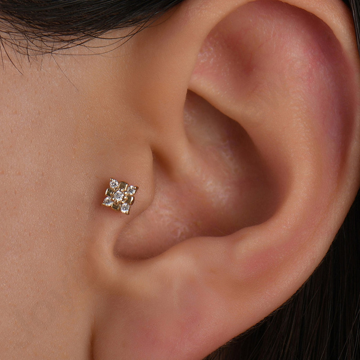 0.04 Carat Flower Diamond Piercing