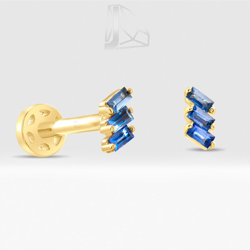 0.08 Carat Baguette Sapphire Piercing · Yellow Gold