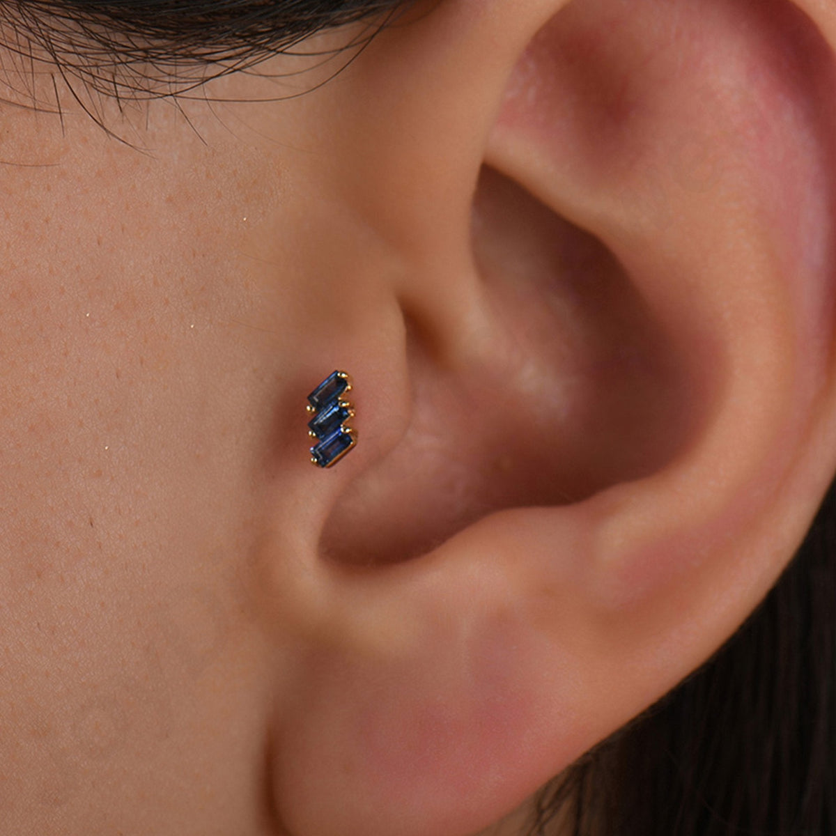 0.08 Carat Baguette Sapphire Piercing