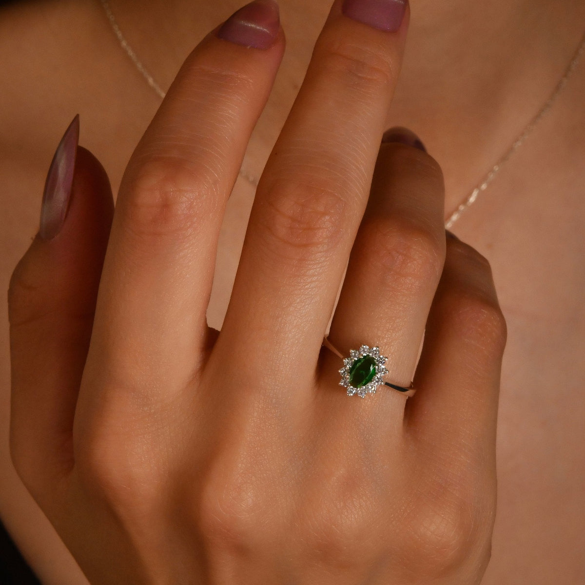 1.04 Carat Oval Emerald Diamond Ring