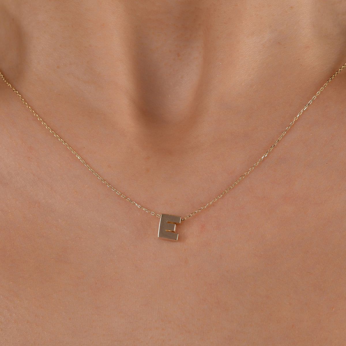 Gold Initial Necklace · Letter E