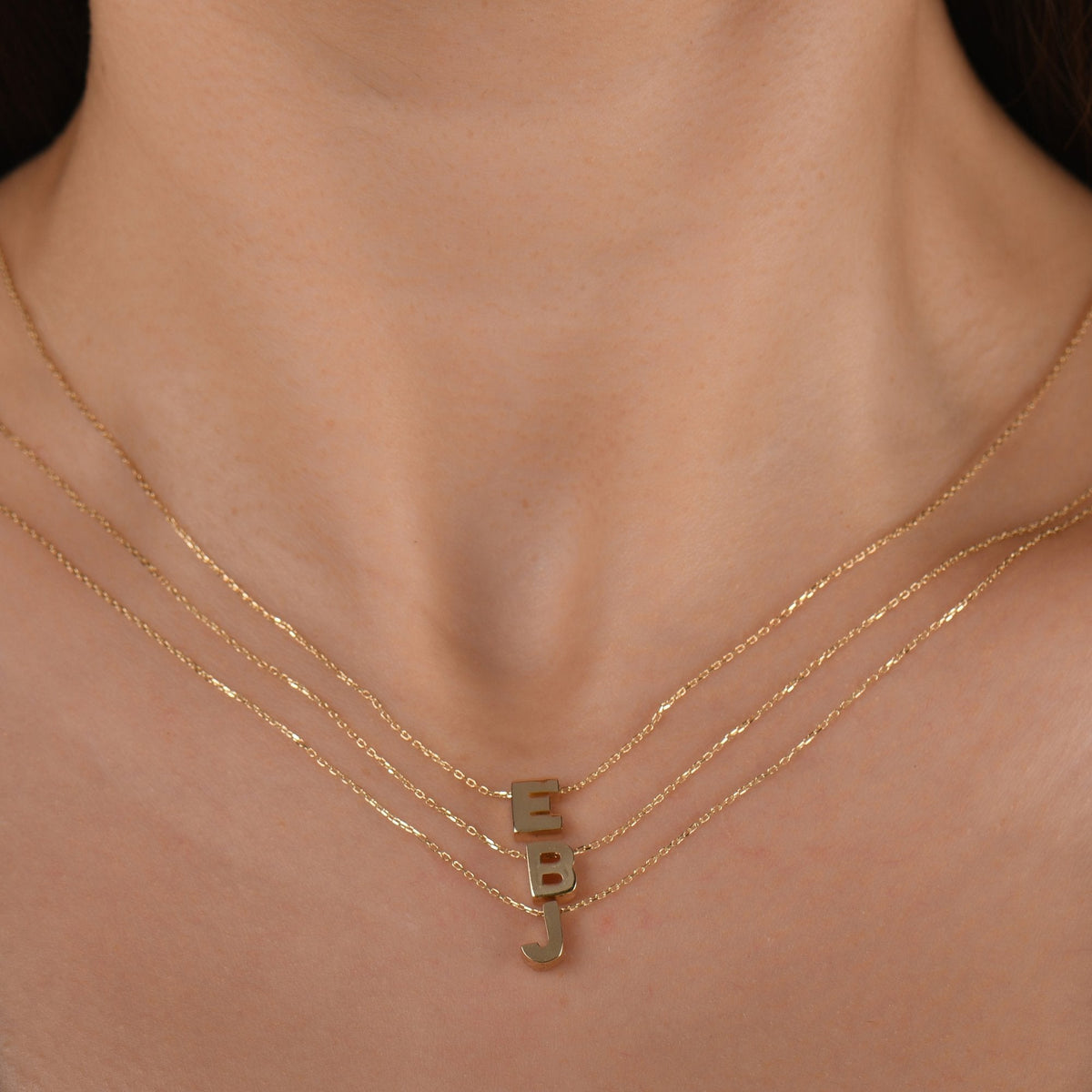 Gold Initial Necklace · Letters E, B and J