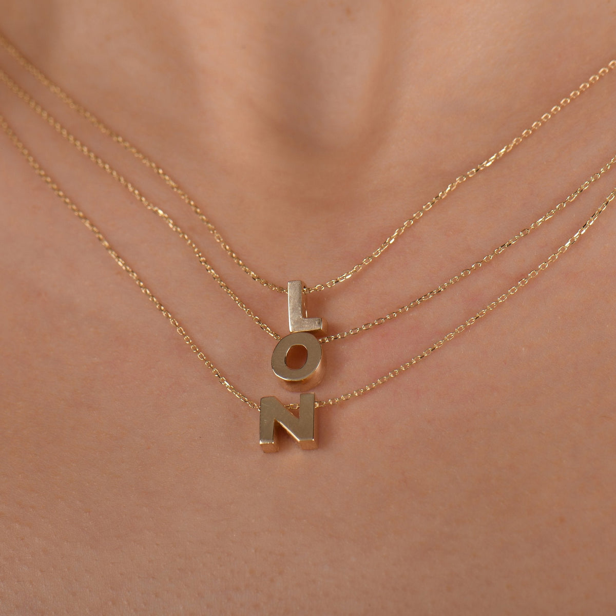 Gold Initial Necklace · Letters L, O and N
