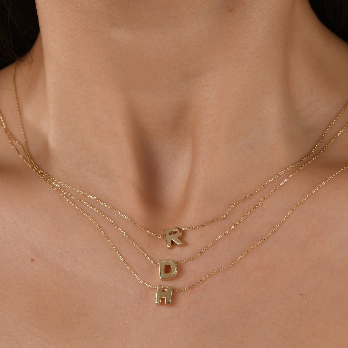 Gold Initial Necklace · Letters R, D and H